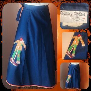 Navy blue wrap around akirt with scarecrow